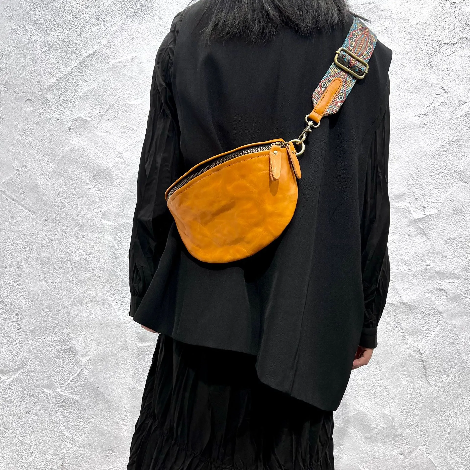 Women's Leather Chest Sling Bag with Boho Shoulder Strap Design
