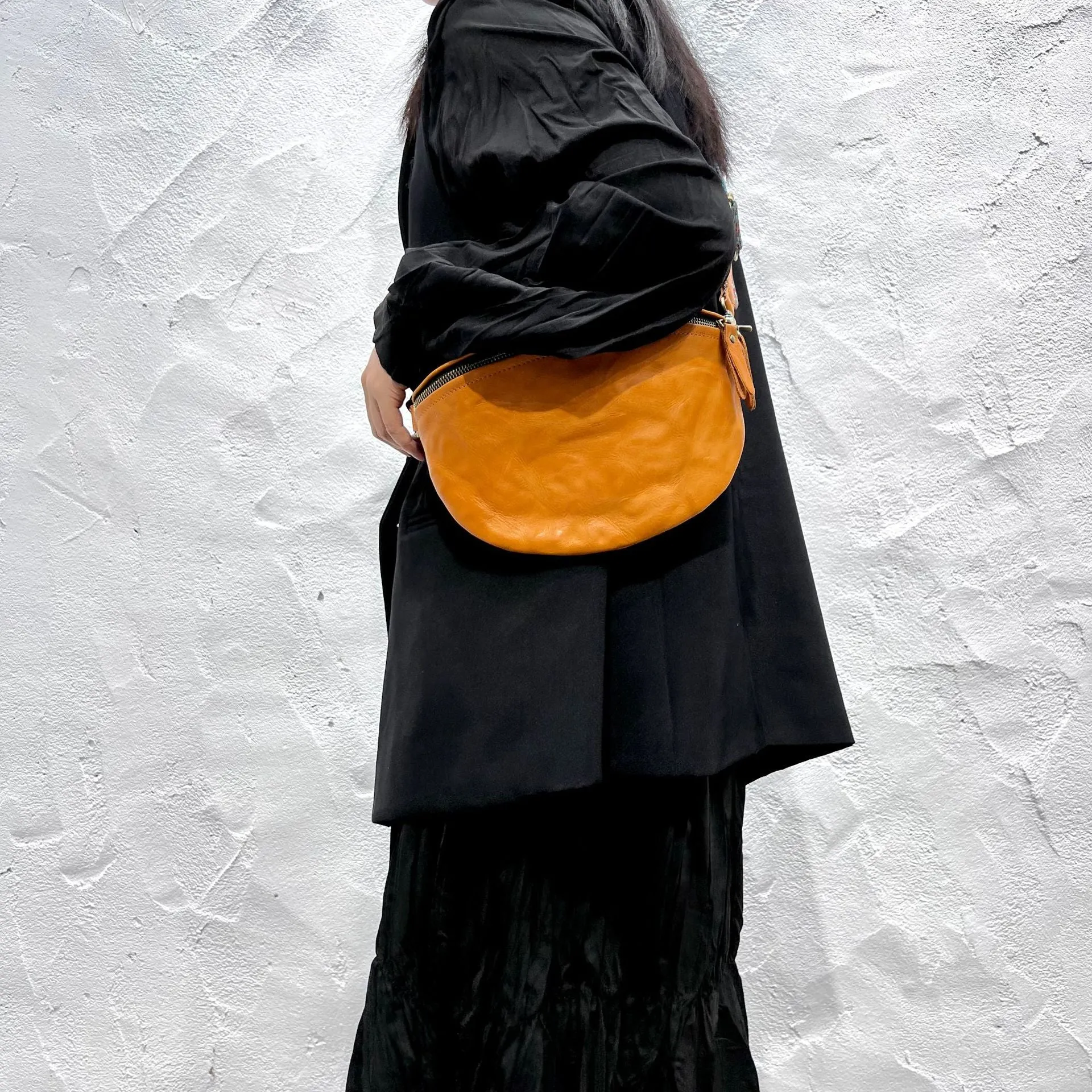Women's Leather Chest Sling Bag with Boho Shoulder Strap Design